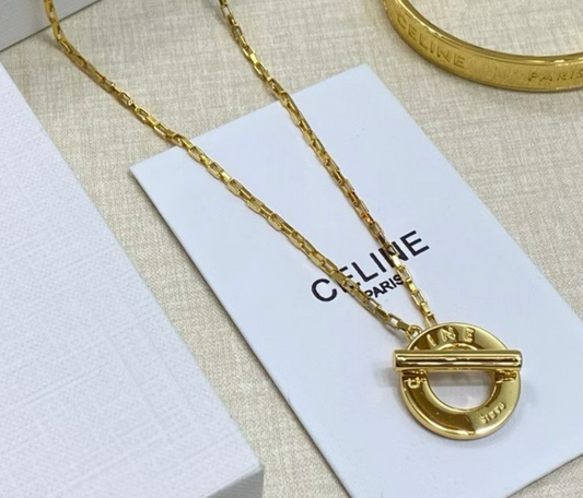 Celine Disc Necklace in Brass with Gold Finish