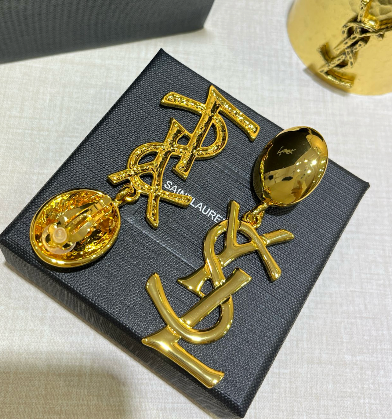 Yves Saint Laurent iconic logo drop earrings