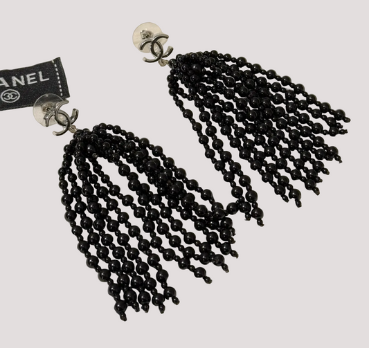 Chanel black beaded cascading chandelier earrings.