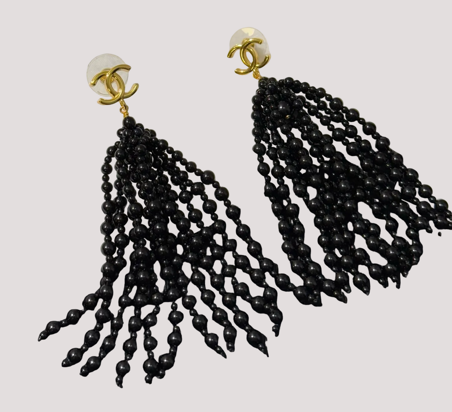 Chanel black beaded cascading chandelier earrings.