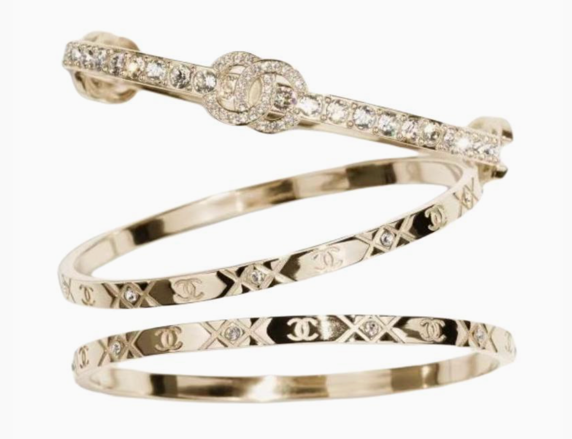 Chanel gold-tone metal crystal cuff bangle bracelet.