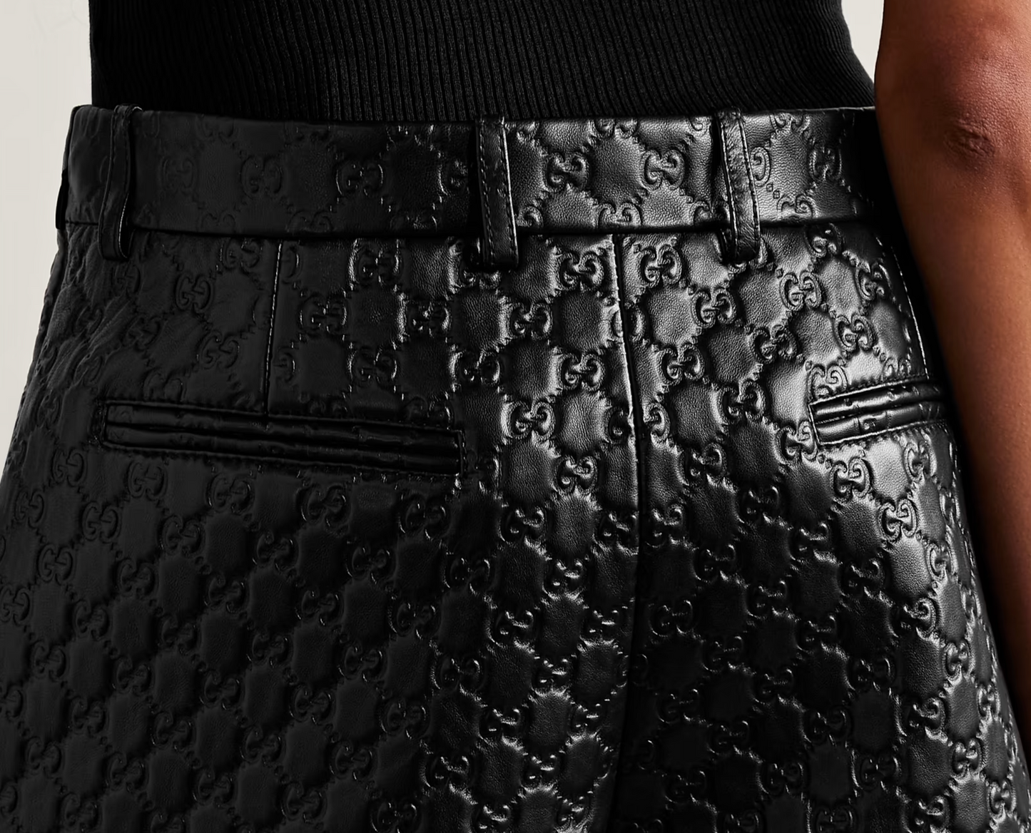 GUCCI Debossed leather shorts