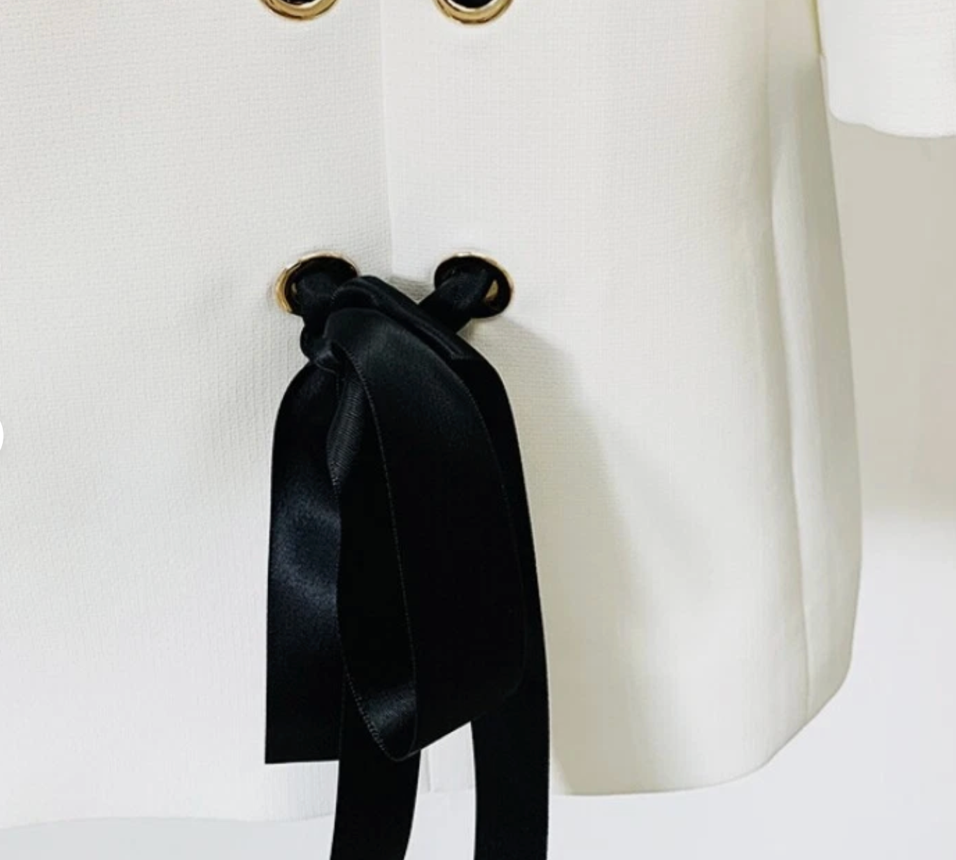 Long-sleeved cream mini dress