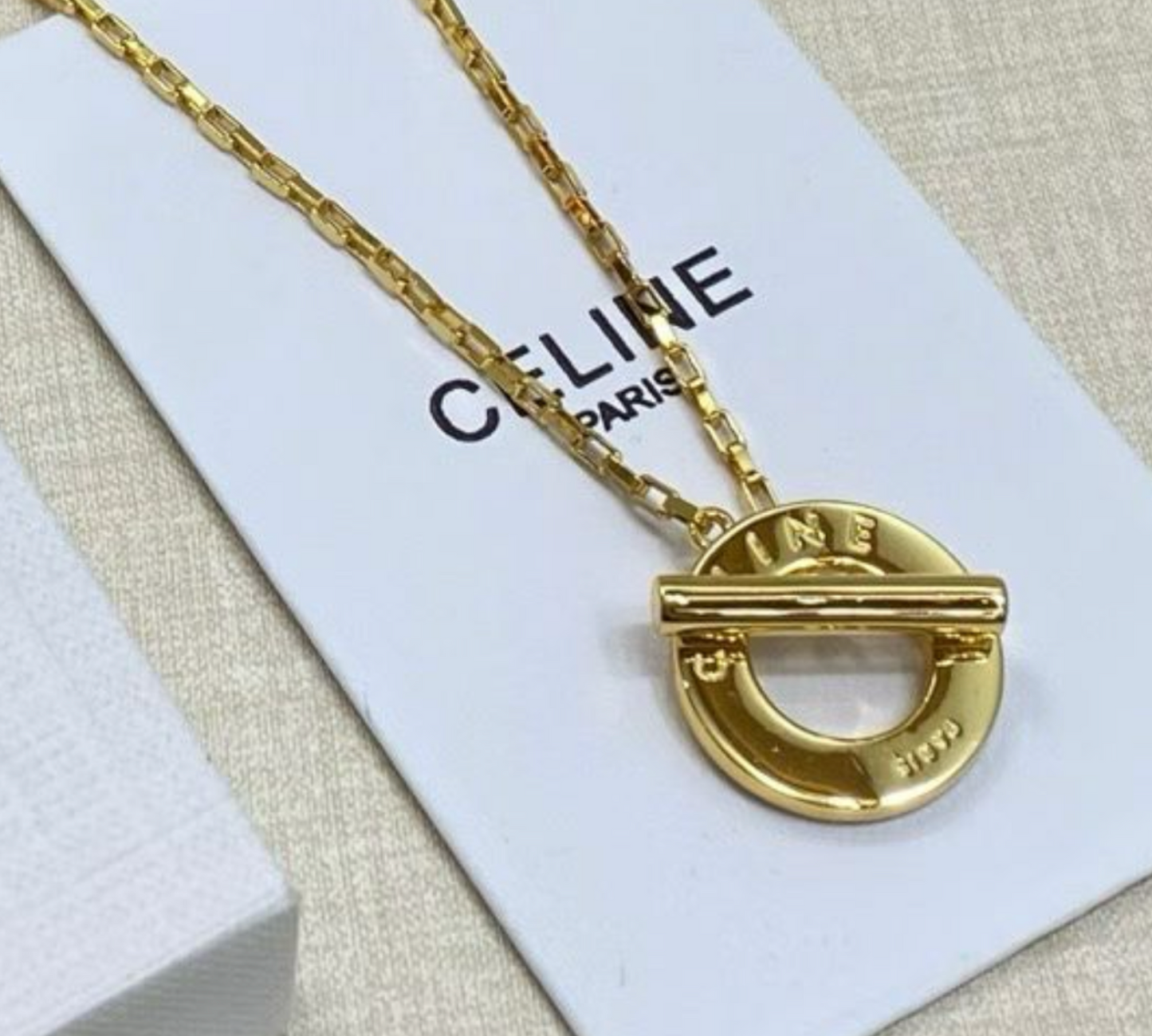 Celine Disc Necklace in Brass with Gold Finish