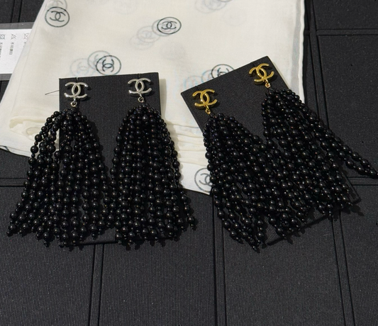 Chanel black beaded cascading chandelier earrings.