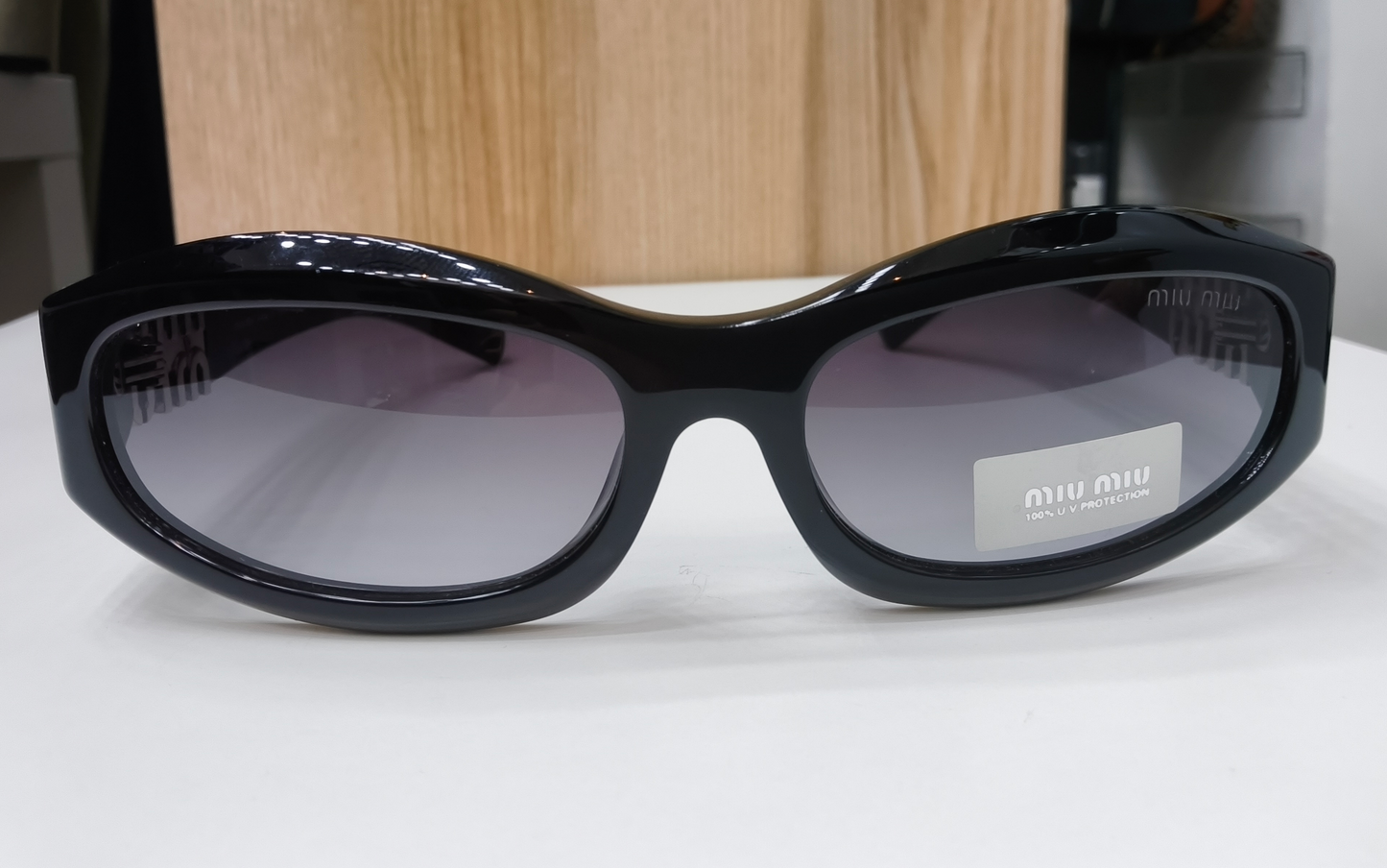 Miu Miu MU 14ZS "Glimpse" Sunglasses
