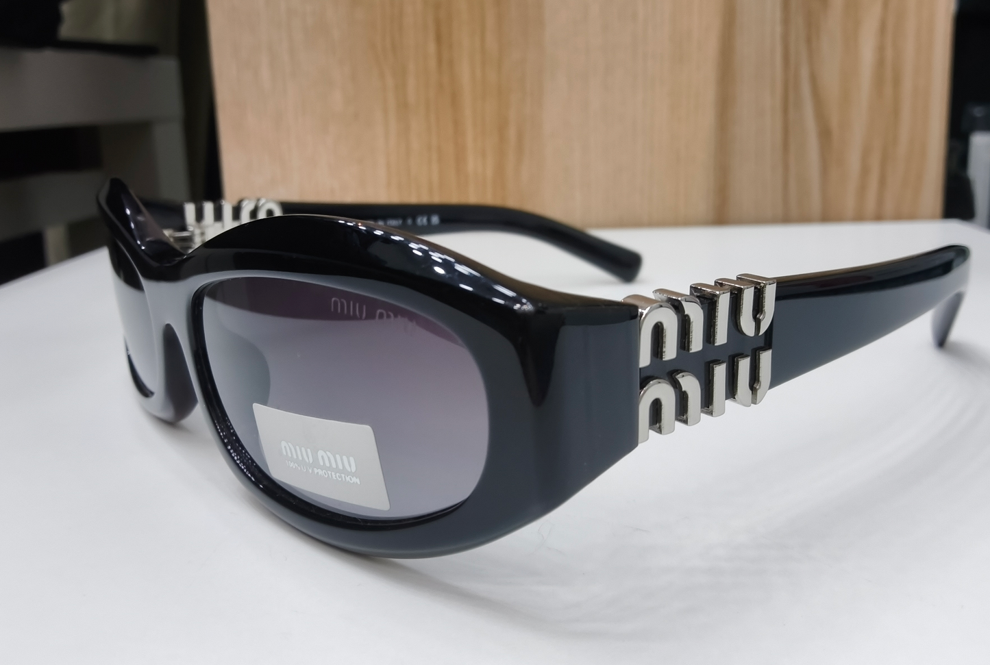 Miu Miu MU 14ZS "Glimpse" Sunglasses