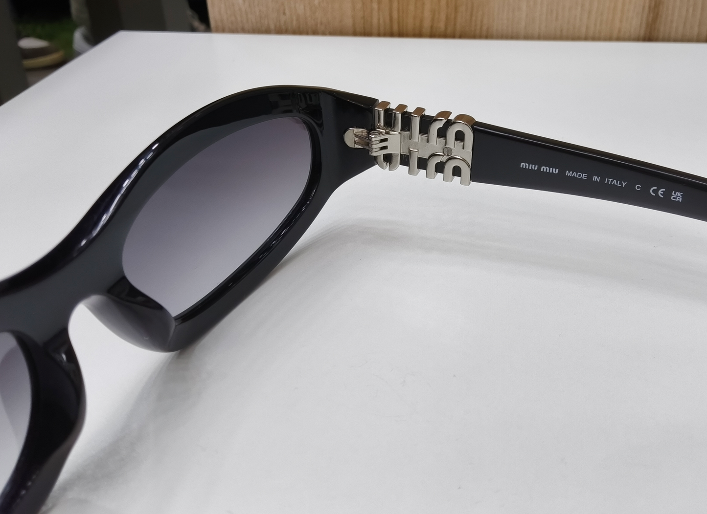 Miu Miu MU 14ZS "Glimpse" Sunglasses
