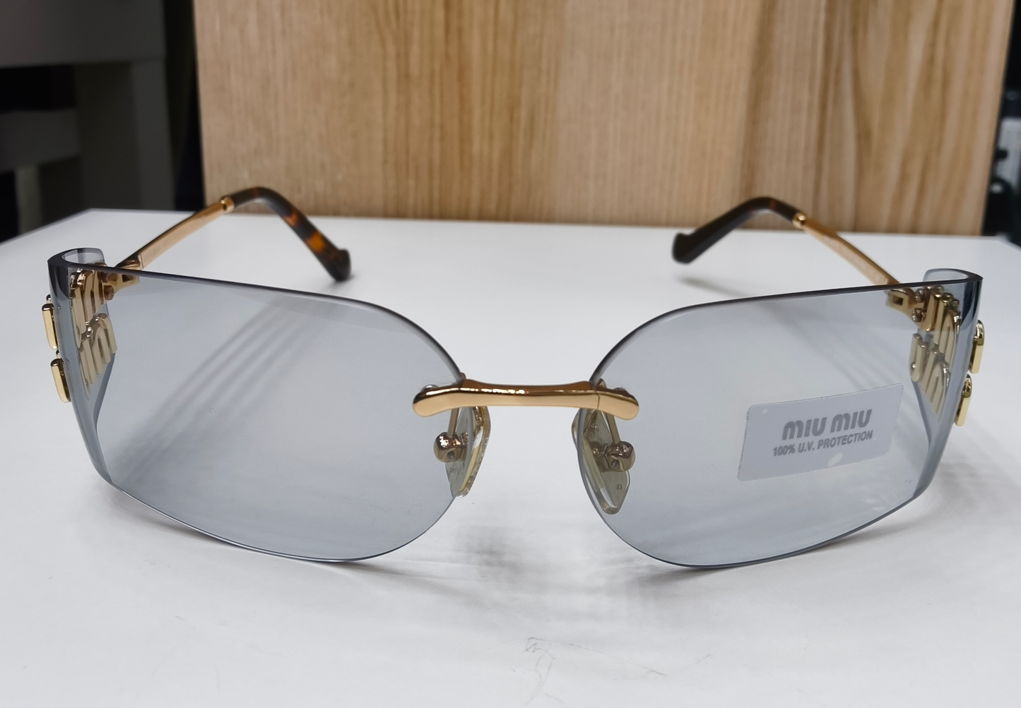 Miu Miu MU A51S Rimless Shield Sunglasses