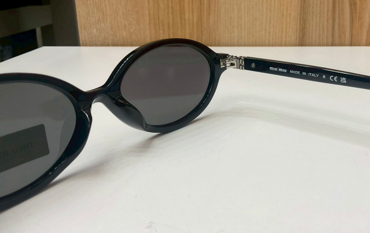Miu Miu Regard Oval Sunglasses
