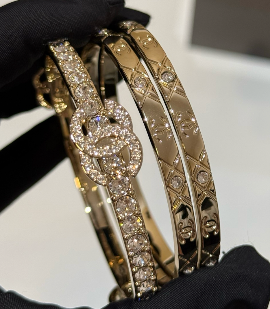 Chanel gold-tone metal crystal cuff bangle bracelet.