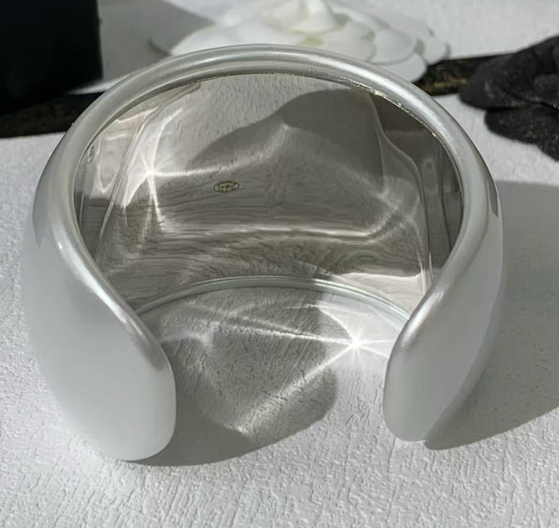 Chanel wide acrylic cuff bracelet