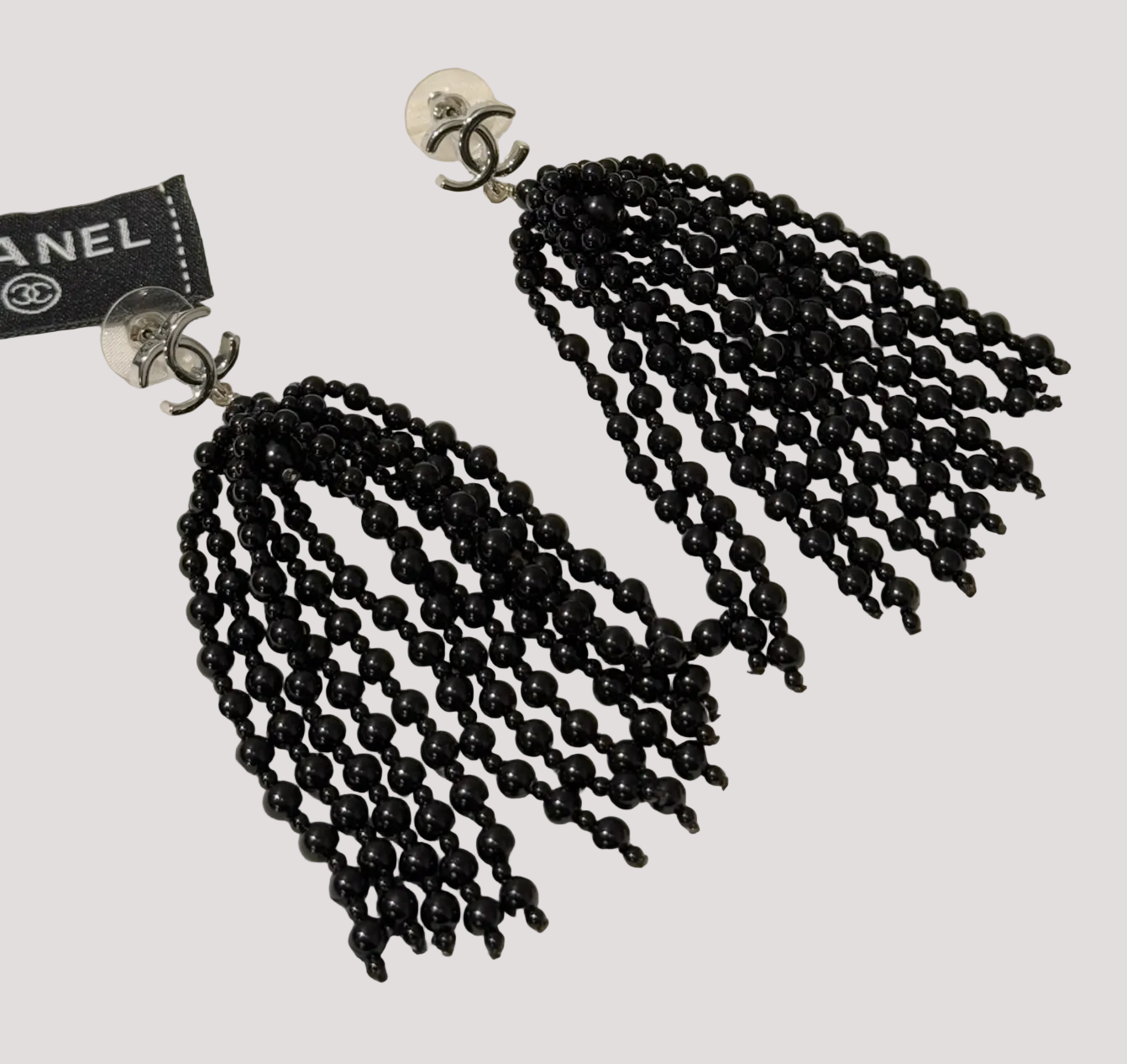 Chanel black beaded cascading chandelier earrings.