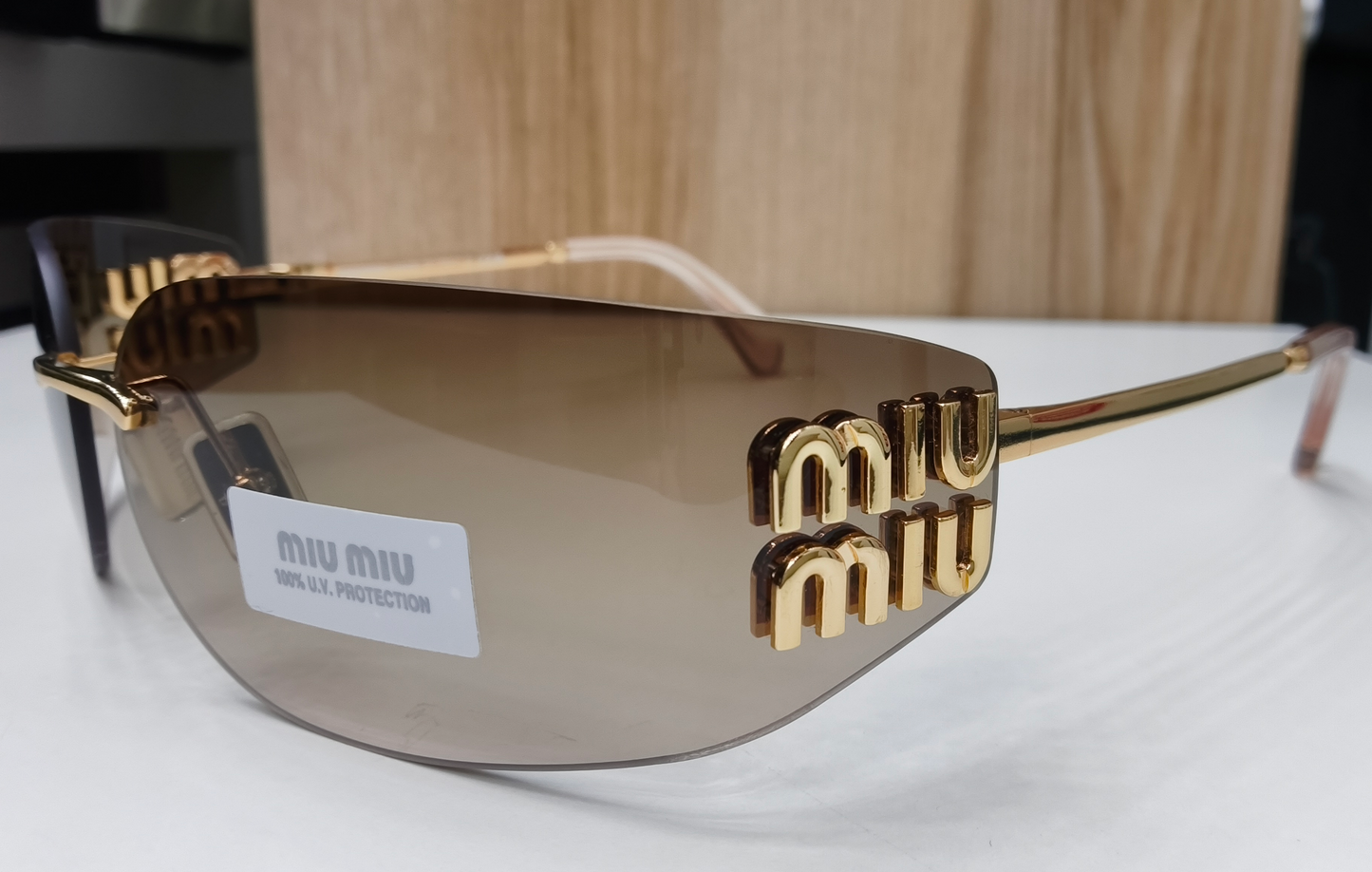 Miu Miu MU A51S Rimless Shield Sunglasses