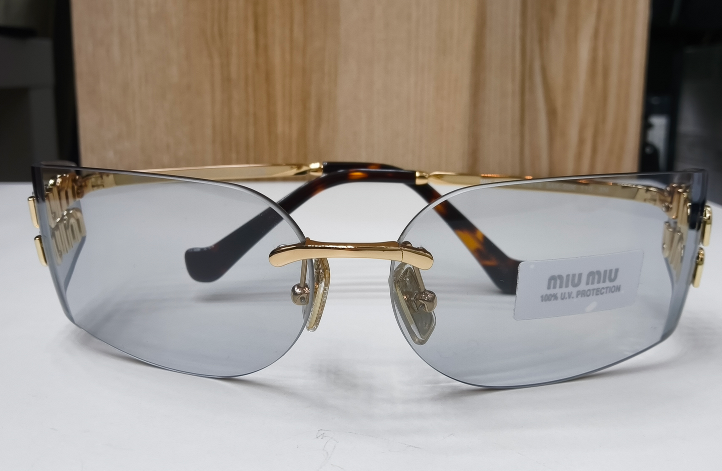 Miu Miu MU A51S Rimless Shield Sunglasses