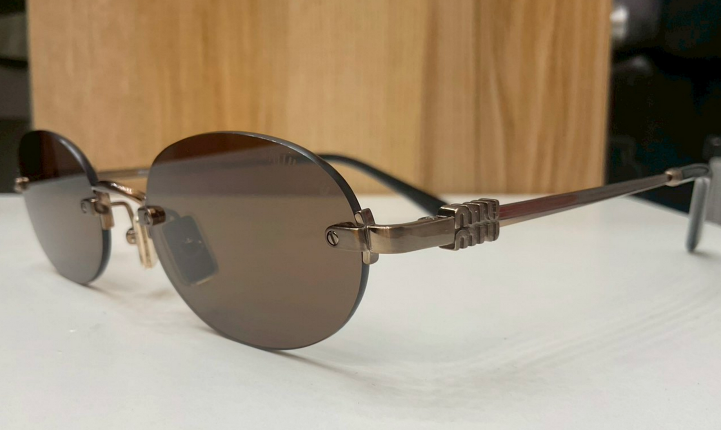 Miu Miu MU A54S rimless oval sunglasses